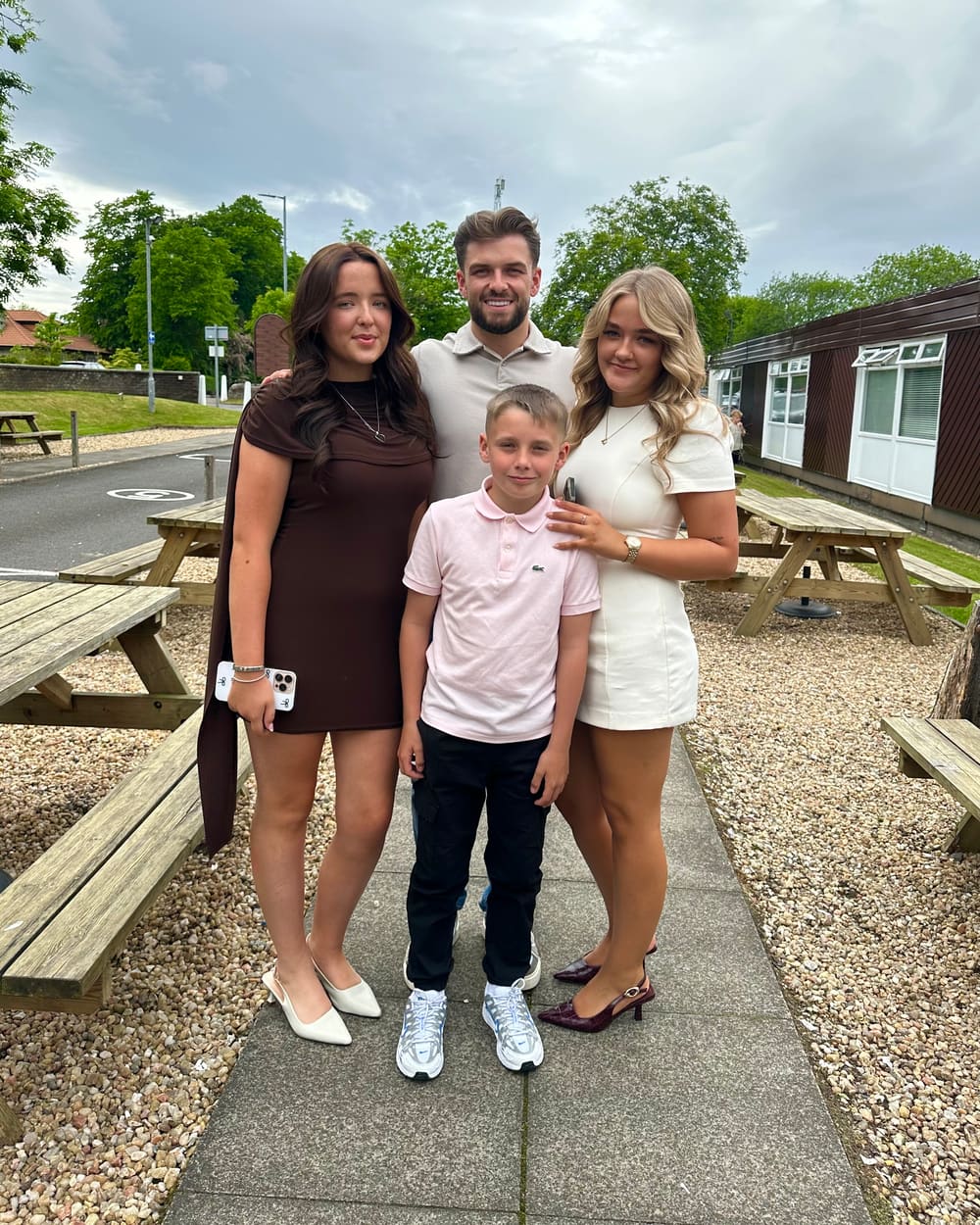 Derek with his three younger siblings